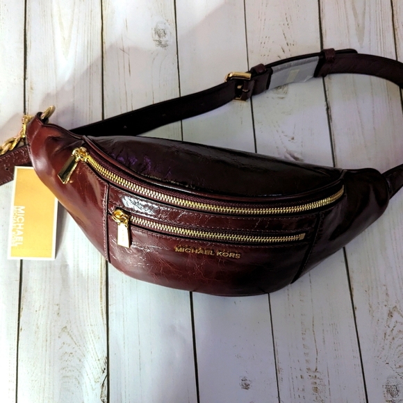 Michael Kors Other - Micheal Kors Wine color Fanny Pack 3 zipper ( color is not red)